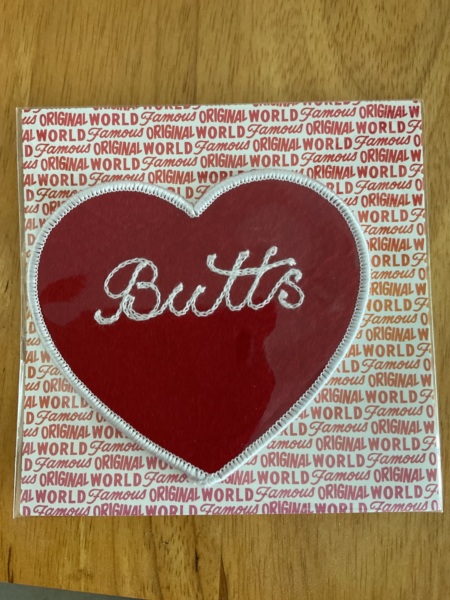 Chain stitch heart badge